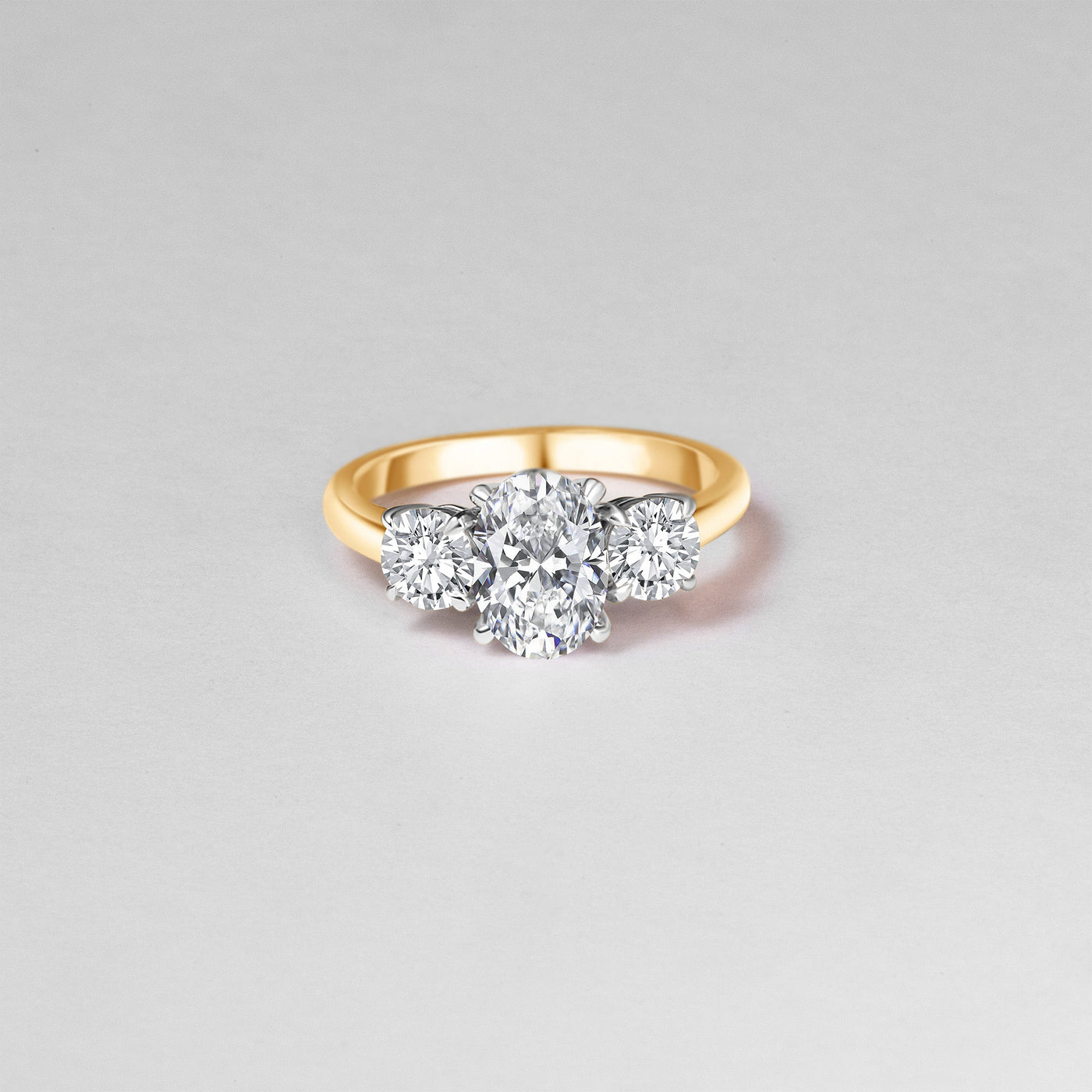 The Vivienne - Oval & Round Brilliant Cut Diamond Three Stone Ring